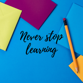 carta, matita e scritta Never stop learning